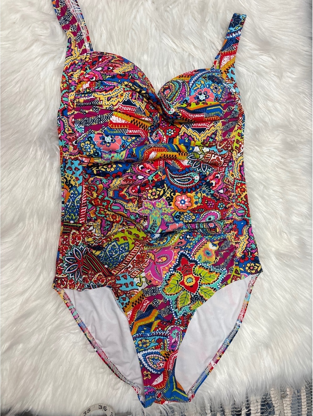* | Niptuck | one piece. Size 8.